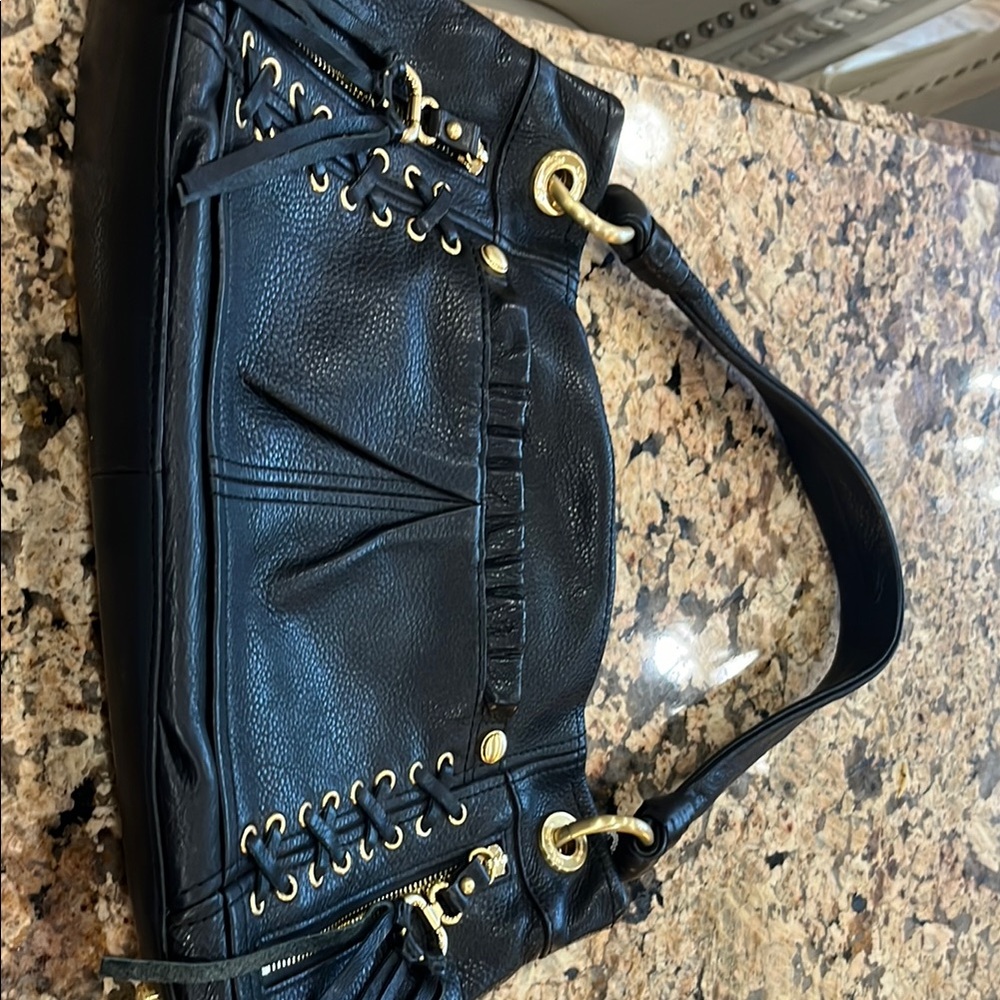 Black and Gold Shoulder Bag with Structured Design